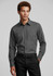 A long sleeve button-up shirt in dark grey, featuring two chest pockets and a logo on the sleeve.