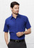 A blue short sleeve button-up shirt for men, featuring a chest pocket and a sleek design.