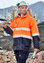 Men's hi-vis waterproof jacket in bright orange with reflective stripes, paired with a hard hat and work gloves.