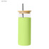 A drink bottle in light green with a wooden lid and a metal straw, featuring a sleek design.
