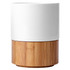 A ceramic mug with a white top and a natural bamboo base, featuring a simple, modern design. 