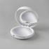 A white compact with a mirror, designed for lip gloss or lip balm. The interior is smoothly finished.