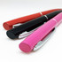 Three metal pens in red, black, and pink, featuring shiny chrome accents and clips. Each pen has a rounded end.