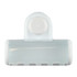 A clear plastic toothbrush holder with a white top and a circular attachment. It features multiple slots for toothbrushes.