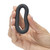 Fifty Shades of Grey A Perfect O love ring held in a hand to show its compact size