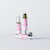 Three JO Vaginal Tightening Serum 50mL bottles, one open showing the pump