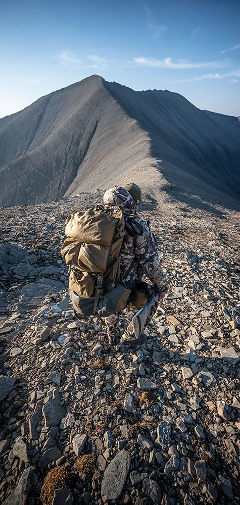 Man in snow camo shooting Bergara rifle
