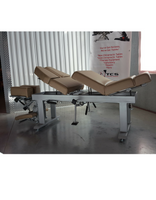 Stationary 2 drop bench cervical drop and pelvic drop, cervical elevation, tilt and translateral head piece slide, chiropractic table.