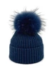 Navy Pom Hat by Linda Richards with large fur pom pom on top, navy blue color.