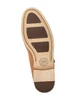 Johnston & Murphy Baldwin Cognac Penny Loafer sole view, showcasing leather and rubber construction details.