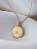 Penn State Sunburst Cavan Gold Seal Necklace by Kyle Cavan, 15mm gold pendant on chain.