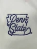 Penn State Keystone logo embroidered on white adidas polo shirt, featuring Twistknit fabric.