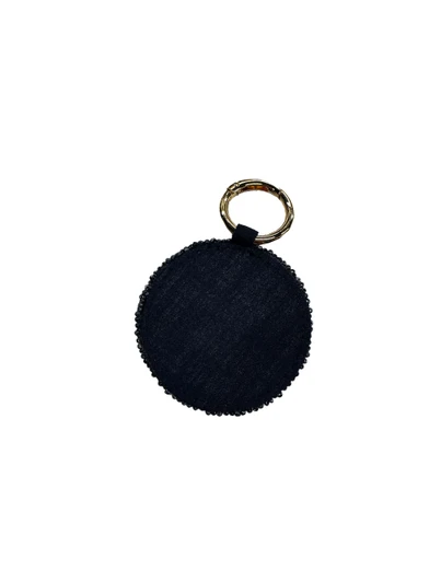 Tiana Designs black beaded paw print key fob, round in shape with gold tone metal ring.