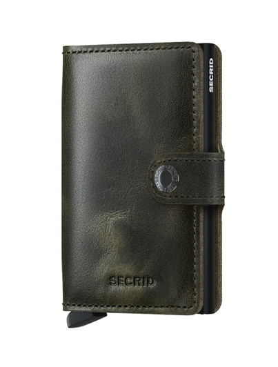 Secrid Vintage Miniwallet in dark green leather with silver logo and strap closure.