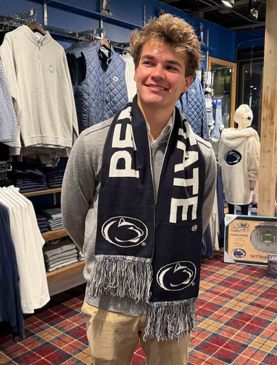 LogoFit We Are Penn State Reversible Scarf in navy blue and white with fringe trim.
