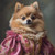 Pomeranian dog dressed in a traditional, ornate pink and gold outfit with ruffle