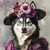 Siberian Husky with a decorative hat featuring a floral arrangement, primarily f