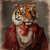 Gentelman Tiger in a red, ornate jacket with intricate patterns and a large, dec