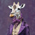 Gentelman Giraaffe with a rich, ornate suit, predominantly in shades of purple P Gentelman Giraaffe with a rich, ornate suit, predominantly in shades of purple P