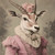 Lady Antelope with a headpiece featuring a rose and a detailed, ruffled ruff-li