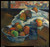 paul-gauguin---bowl-of-fruit-and-tankard-before-a-window_16330499706_o(1) Poster