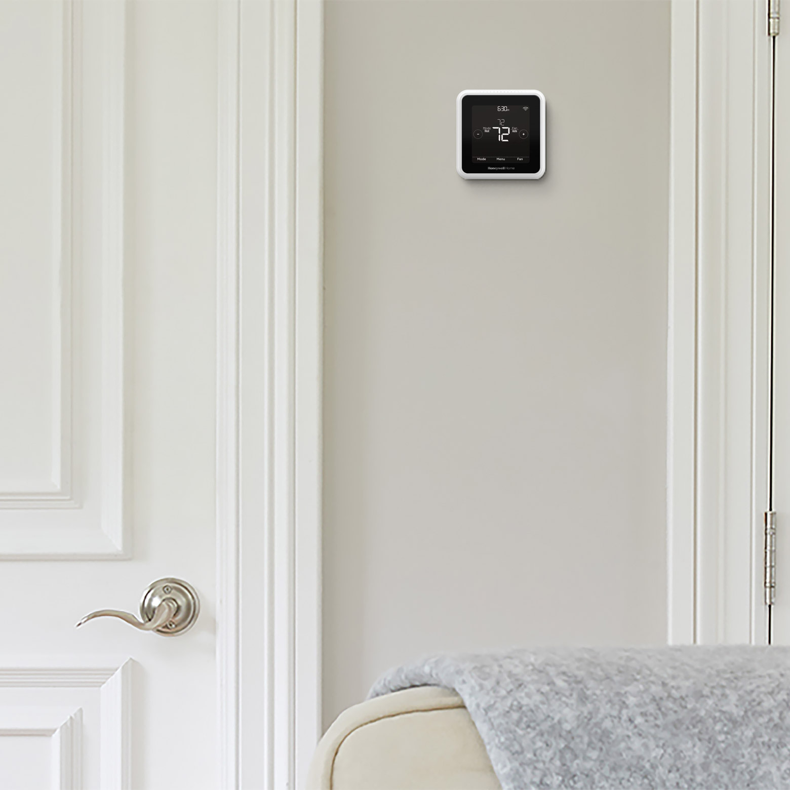 thermostat on wall in hallway