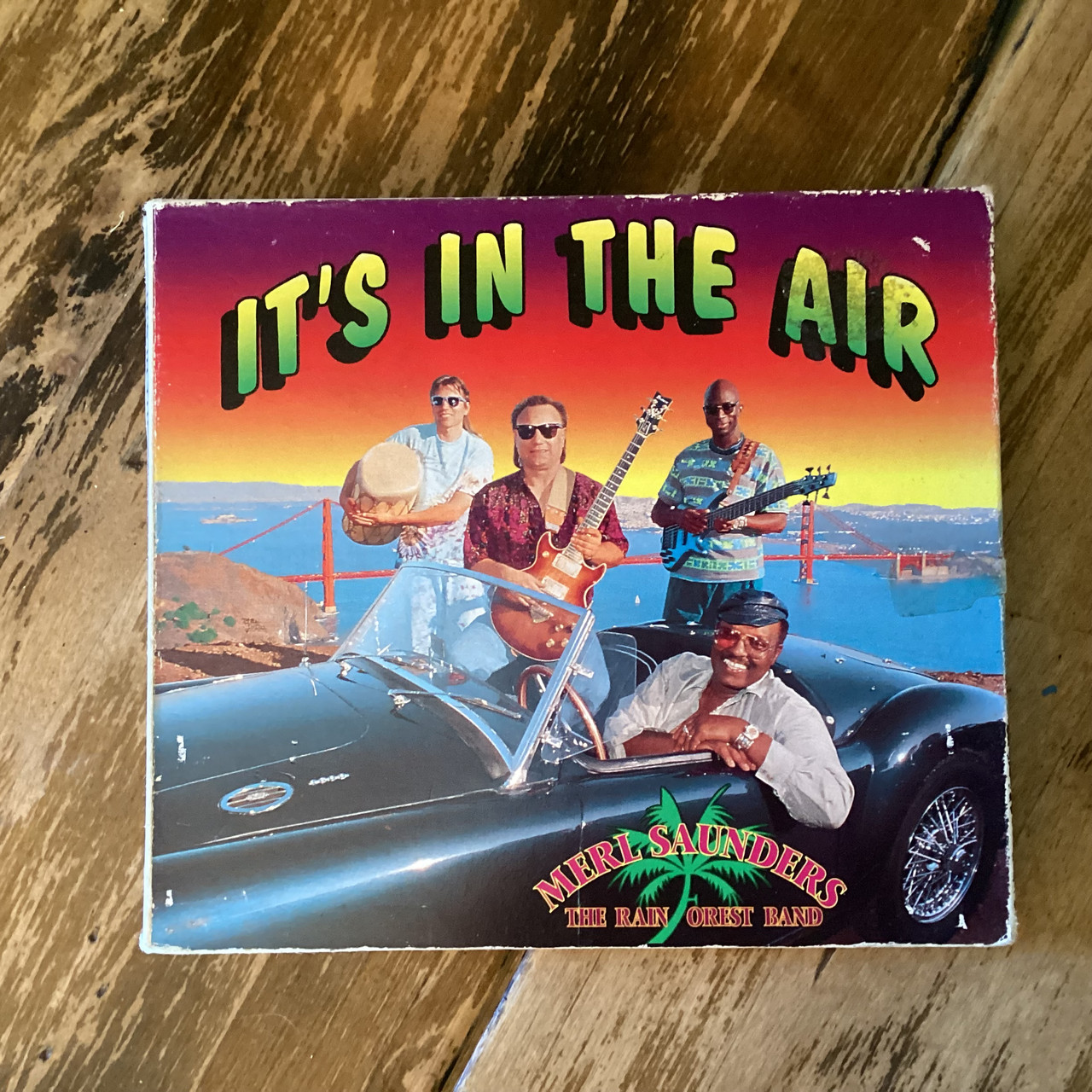 CD COMPACT DISC - Merl Saunders / The Rain Forest Band - It's In The Air - COMPACT DISC CD COMPACT DISC - Merl Saunders / The Rain Forest Band - It's In The Air - COMPACT DISC