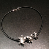 Pewter Cast Lumbar Vertebrae on rubber cord Pewter Cast Lumbar Vertebrae on rubber cord