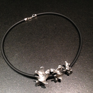 Pewter Cast Lumbar Vertebrae on rubber cord