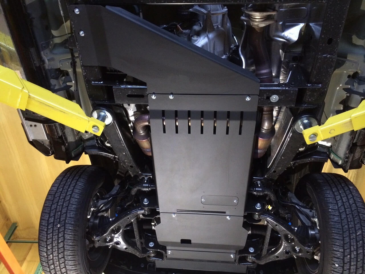 RCI Metalworks Raptor transmission skid plate installed