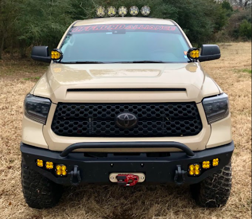 The Stormtrooper Bumper from Expedition One is the perfect frame for Baja Designs lights and a Warn winch.