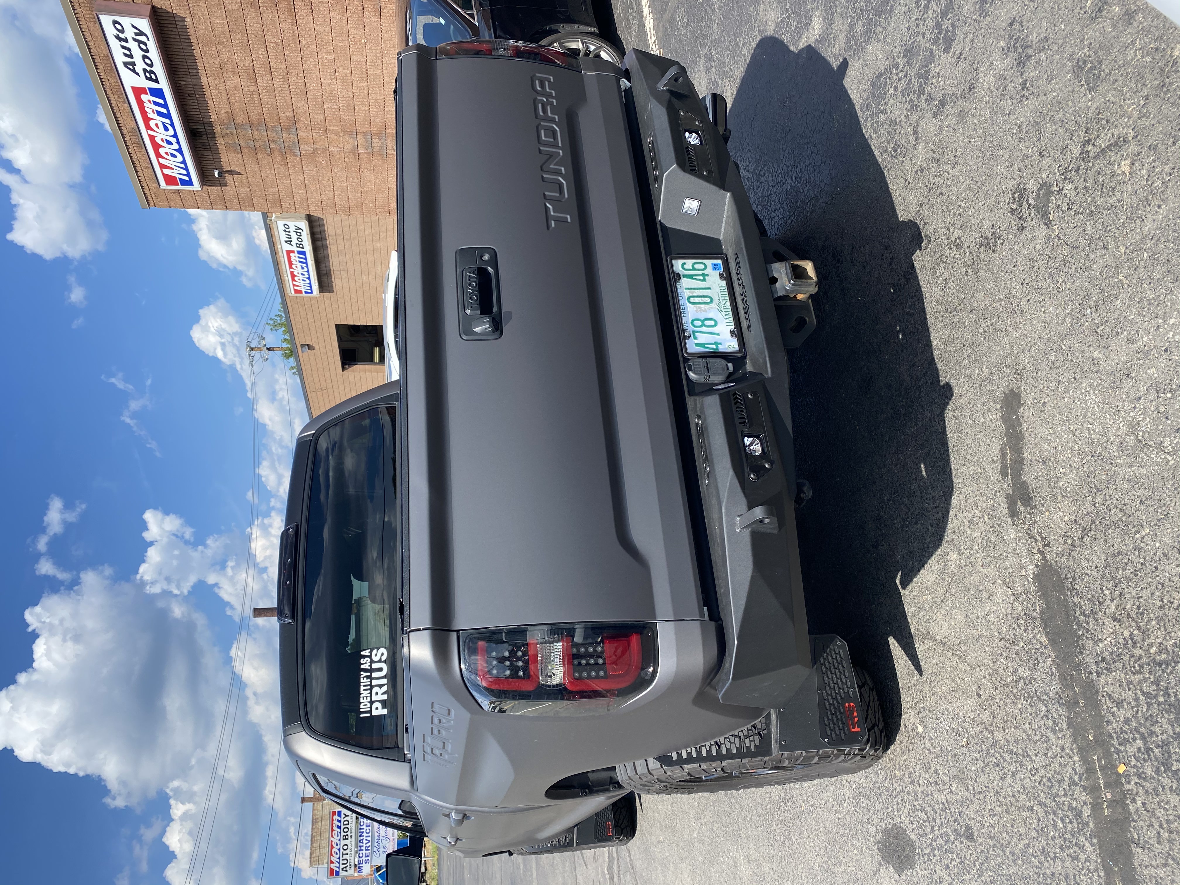 
Grey Toyota Tundra with Addictive Desert Designs Front and Rear Stealth Fighter Bumper and Rigid Lighting
