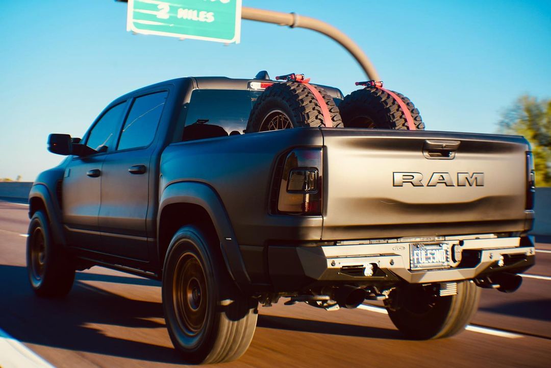 Matte Black Ram TRX with Addictive Desert Designs front and rear bumpers and Baja Designs Lighting 