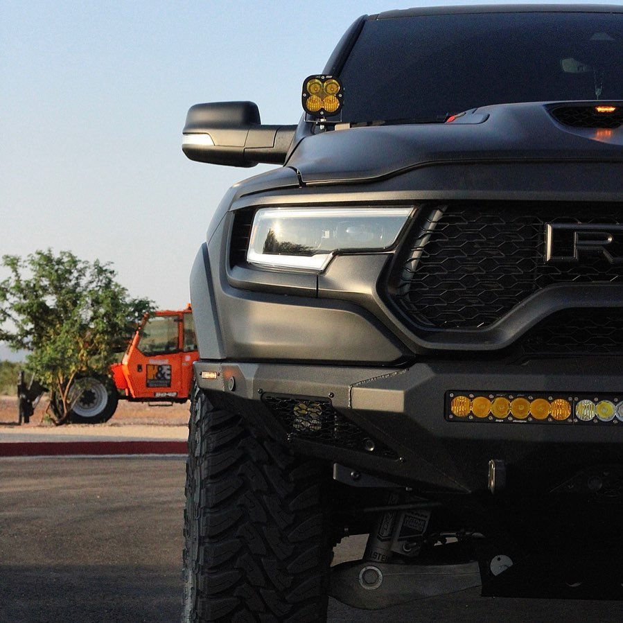 Matte Black Ram TRX with Addictive Desert Designs front and rear bumpers and Baja Designs Lighting 