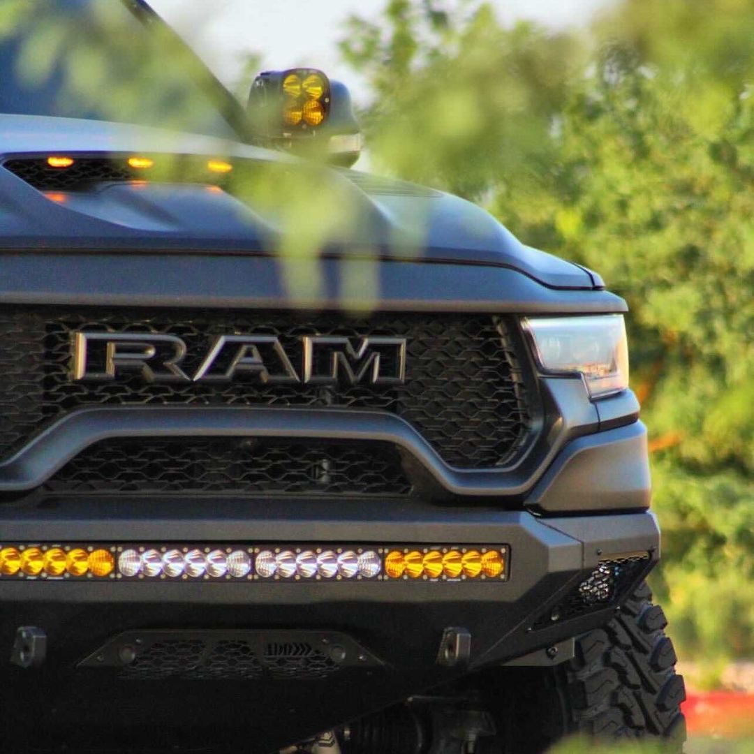 Matte Black Ram TRX with Addictive Desert Designs front and rear bumpers and Baja Designs Lighting 