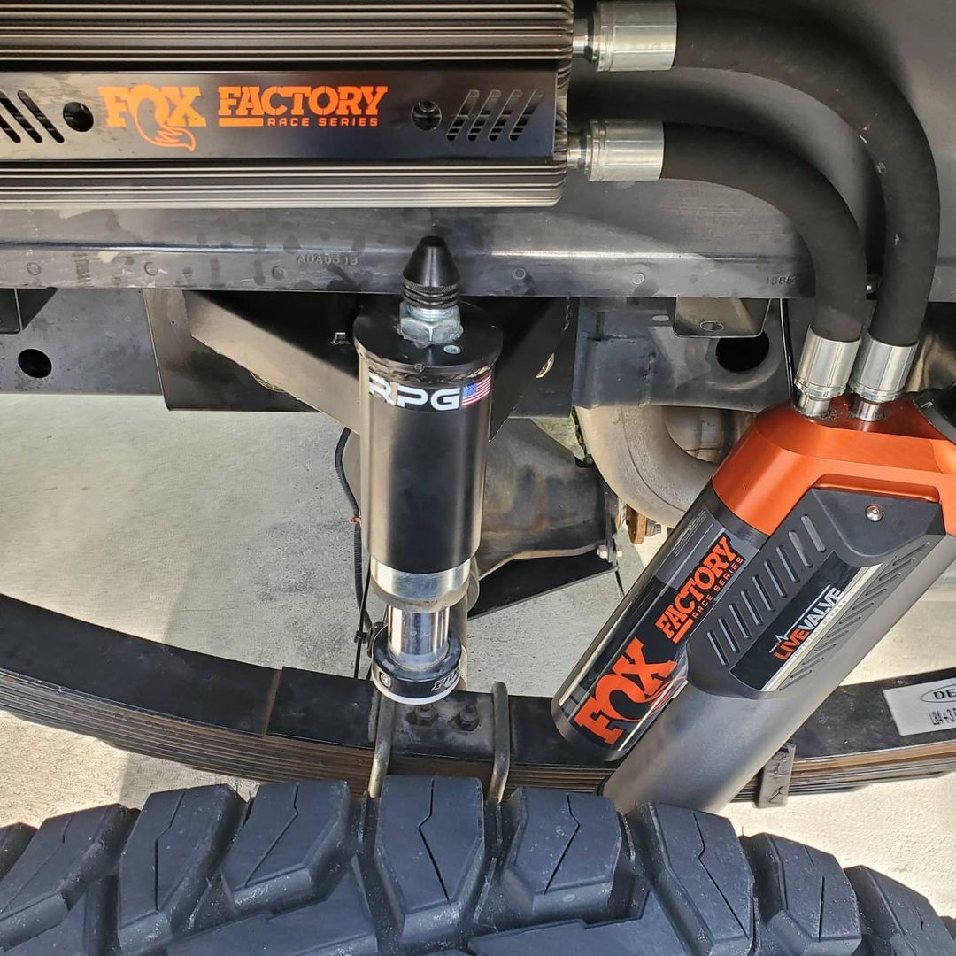 2019 Black Ford Raptor RPG bump stop kit with Fox 2.0 bump stops, Deaver +3 leaf springs, fox 3.0 live valve shocks
