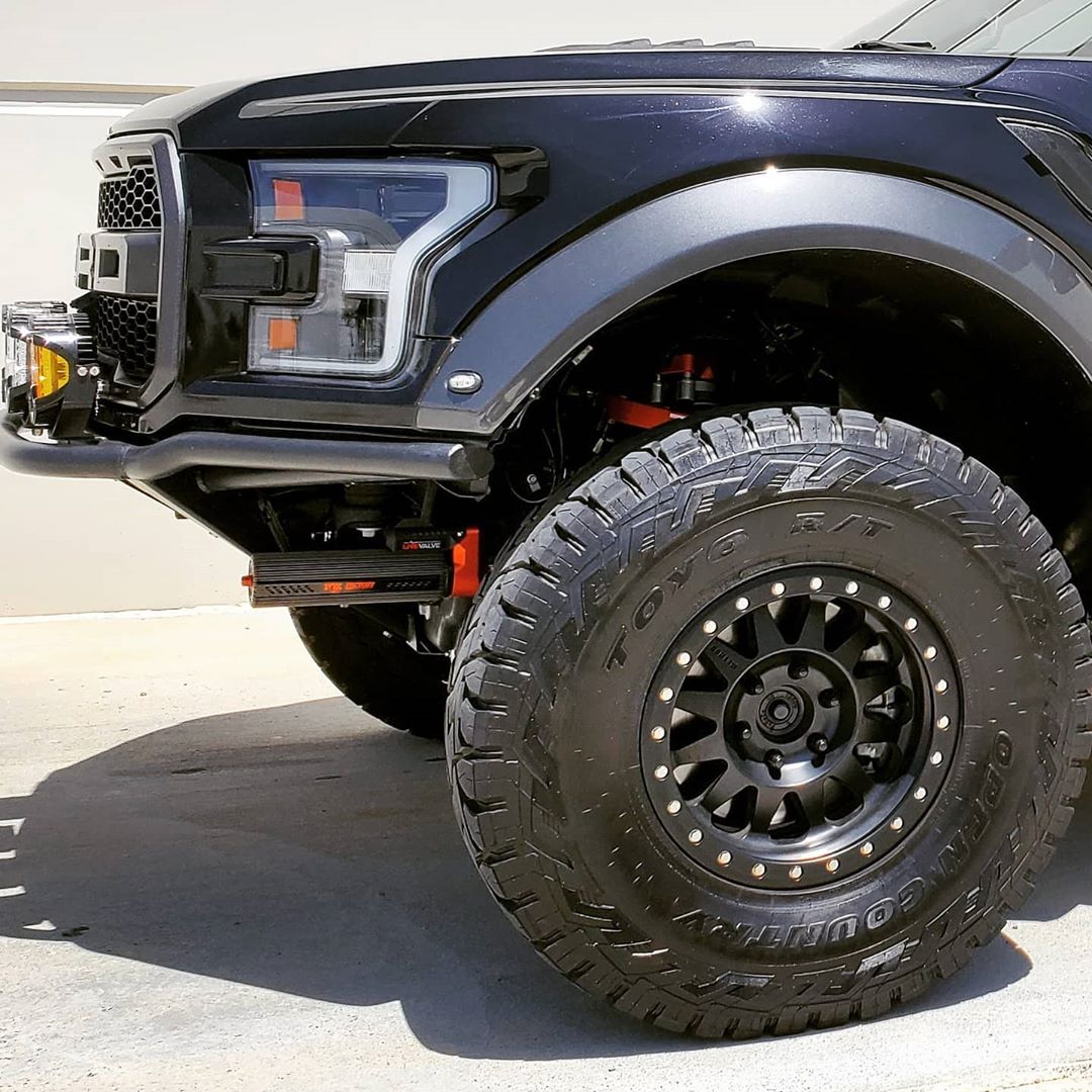 2019 Black Ford Raptor RPG Frame cut front bumper Baja designs LP6 LED lights Method 304 Wheels with Toyo Open Country RT Tires