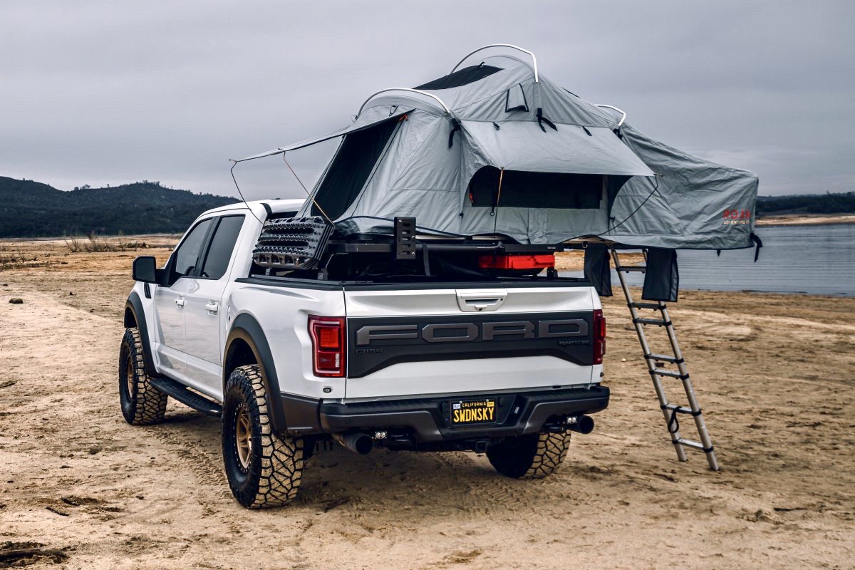 White Raptor with Front Runner Bed Rack and Roam Roof top tent 