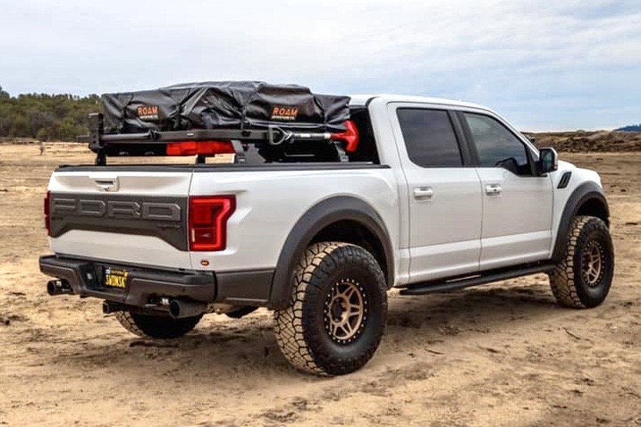 White Raptor with Front Runner Bed Rack and Roam Roof top tent 