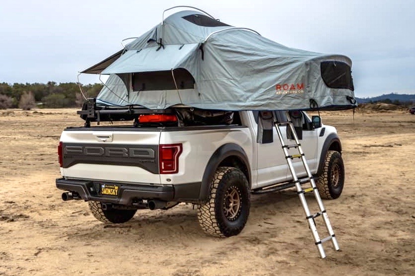 White Raptor with Front Runner Bed Rack and Roam Roof top tent 