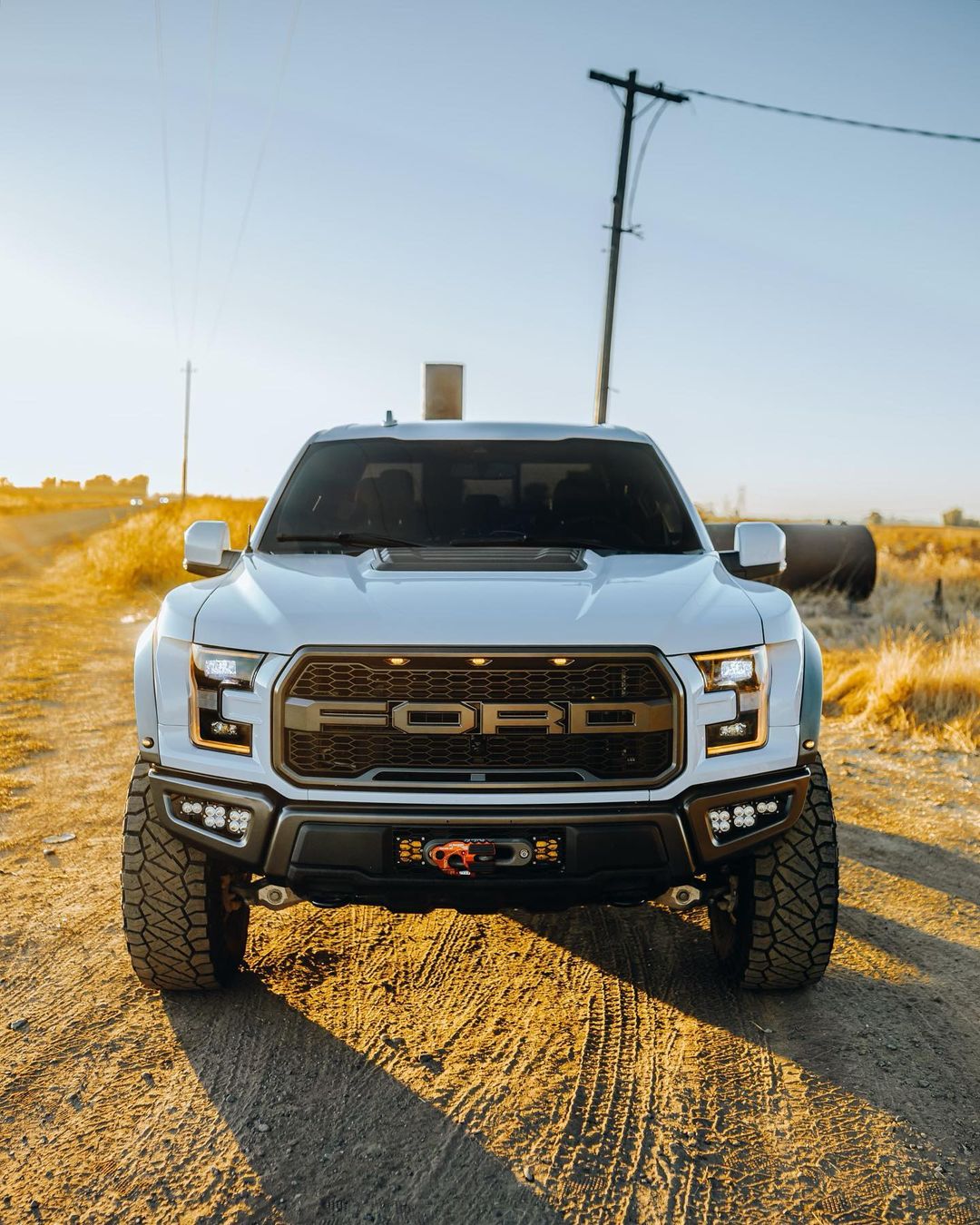 White Raptor with Front Runner Bed Rack and Roam Roof top tent 