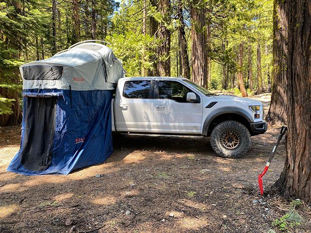 White Raptor with Front Runner Bed Rack and Roam Roof top tent 