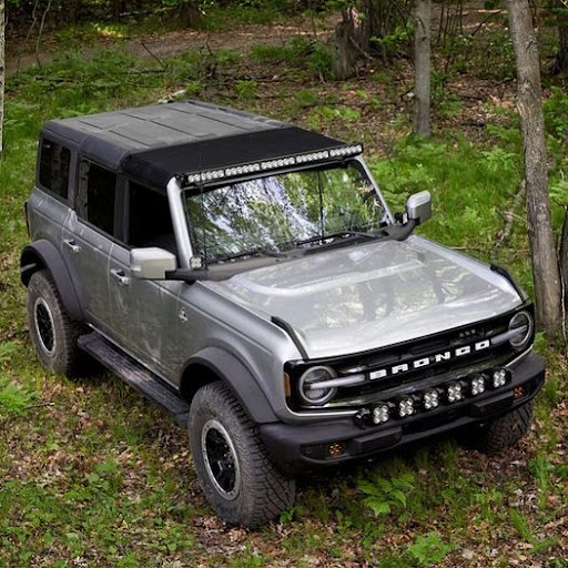 Silver Ford Bronco on an offroad trail