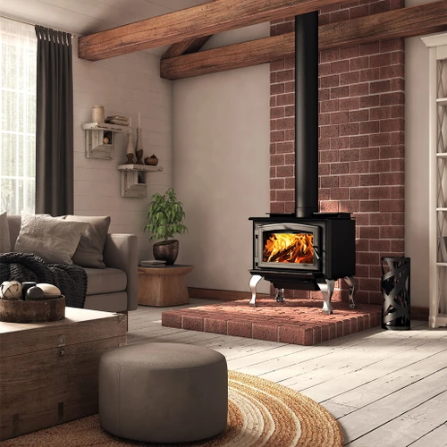 Osburn 1700 Wood Stove | This unit is equipped with high-density bricks, a stainless steel heat shield added to the C-Cast baffle, a cast iron door, a built-in ash pan, a top heat deflector that redirects heat to the front of the unit, and side panels to reduce its clearances.