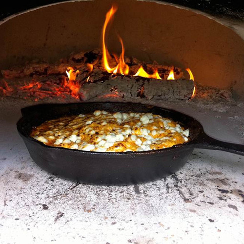 Chicago Brick Oven 750 Hybrid Countertop Pizza Oven |  Burn wood at the back or side of the oven to bring Chicago Brick Oven's wood-fired flavor into every meal you make.