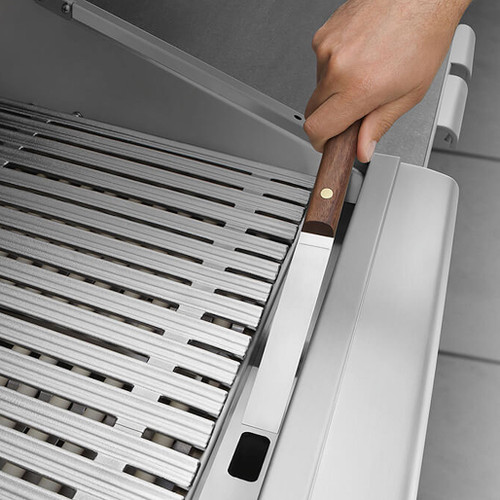 DCS 48" 7 Series Freestanding Gas Grill | One side has a gentle radius for handling delicate foods. The other side is W-shaped for perfect sear lines while channeling oil away to an easily removable drip tray.