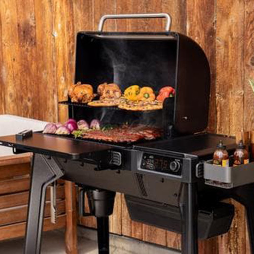 Traeger Woodridge Freestanding Pellet Grill | Convenient hopper clean-out lets you switch pellet flavors quickly