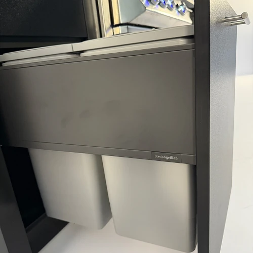 Station Grill DH32 Ready-Made Outdoor Kitchen Kit | 18’’ Cabinet with Pull-Out with garbage and recycle bins and a drawer on top.