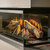 NetZero Fire E-One 160 Bay Electric Fireplace | 63.84” W x 14.49” H Glass View