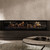 Escea LE1750 70-Inch Electric Fireplace with Logs | Available in two heat output options to suit your space — 5,100 or 10,200 BTU/hr — then enjoy consistent, thermostat-controlled warmth, or switch to flame-only mode.